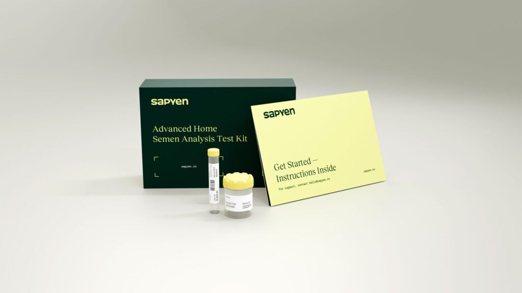 A home semen analysis test kit by Sapyen, including a test tube, specimen container, and instruction booklet displayed on a neutral background. , Kiara Health Fertility