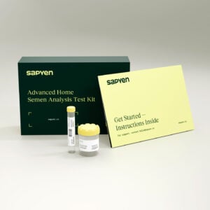 A home semen analysis test kit by Sapyen, including a test tube, specimen container, and instruction booklet displayed on a neutral background. , Kiara Health Fertility