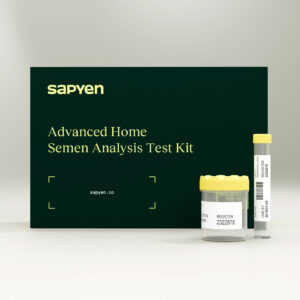 A home semen analysis test kit by Sapyen is displayed with a black box, a specimen cup, and a sample vial with yellow lids on a plain background. , Kiara Health Fertility