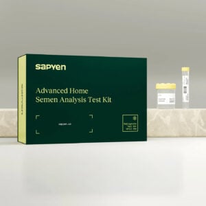 A green box labeled “Advanced Home Semen Analysis Test Kit” from Sapyen sits on a countertop next to a specimen vial with a yellow cap, offering convenient at-home sperm DNA test solutions.